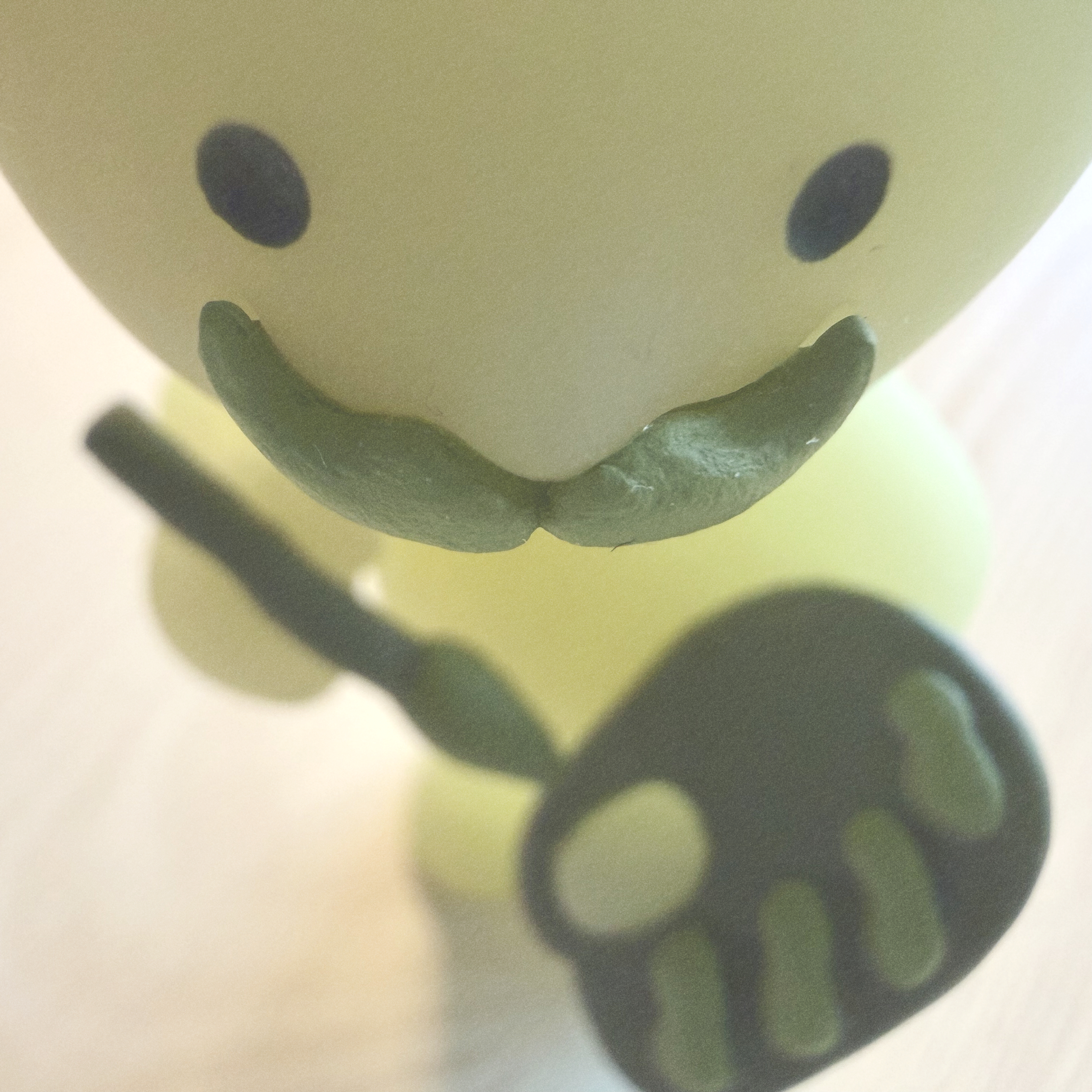 Close up image of the Artist Smiski.